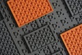 Abstract gray orange background from lego children designer