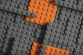 Abstract gray orange background from lego children designer.