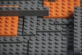 Abstract gray orange background from lego children designer.