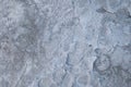 Abstract gray rocky stone background surface with cracks