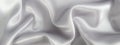 Abstract gray silk satin fabric texture background.