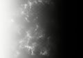 Abstract grayscale gradient texture with soft cloud-like patterns subtle smoke effect overlay Royalty Free Stock Photo