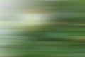 Abstract green background with blurred horizontal stripes