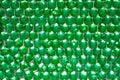 Close up of translucent green crystals. Green beads glittering and shining in the light Royalty Free Stock Photo