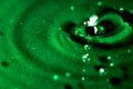 Abstract green background with water, drops and waves macro Royalty Free Stock Photo