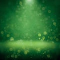 Abstract green blur background with brighter center and bokeh Royalty Free Stock Photo