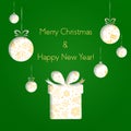 Abstract green Christmas balls and gifts cutted from paper on green background. Happy Hollidays and New Year. Christmas