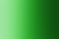 Abstract green darkening blurred gradient background