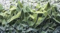 Abstract green and grey low poly background with triangular shapes Royalty Free Stock Photo