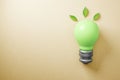 Abstract green lamp on background with mock up place. Energy and save concept. 3D Rendering Royalty Free Stock Photo