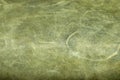 Abstract green leather texture, can be used as a background. alcantara. Royalty Free Stock Photo