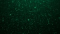 abstract green particulars glow in the dark background Royalty Free Stock Photo