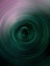 Abstract Green and pink Background Of Spin Circle Radial Motion Blur spinning background. Royalty Free Stock Photo