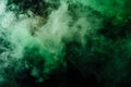 Abstract Green smoke on a dark background. Texture