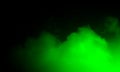 Abstract green smoke mist fog on a black background. Royalty Free Stock Photo