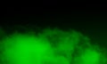 Abstract green smoke mist fog on a black background. Royalty Free Stock Photo