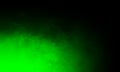 Abstract green Smoke mist fog on Black Background.texture on isolated black background. Royalty Free Stock Photo