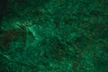 Abstract green texture and background for design. Vintage dark green background. Rough green texture made with stone.