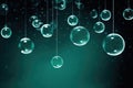 Abstract green transparent balls and bubbles hanging on monocolor background Royalty Free Stock Photo