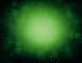 Abstract green vignette background with brighter center and bokeh Royalty Free Stock Photo