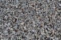 Abstract grey and beige gravel stone background, crushed gray stones and granite pieces texture, large detailed horizontal texture Royalty Free Stock Photo