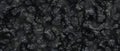 Abstract grey marbled cement or wall with black holes material in the panoramic banner. Cracked cement