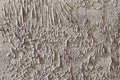 Abstract grey textured background Wallpaper. Old peeling paint on a rough, cracked wall Royalty Free Stock Photo