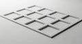 Abstract Grid Pattern with Twelve Square Recesses on a White Surface geometric Royalty Free Stock Photo