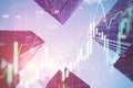 Abstract growing forex chart on blurry city texture. Financial investment and economy concept. Double exposure Royalty Free Stock Photo