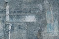 Abstract grunge background texture of a surface from an old weathered bulletin board with remnants of torn paper ads, copy space Royalty Free Stock Photo