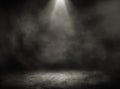 Studio dark room of concrete floor grunge texture background with spot lighting and fog in black background. Royalty Free Stock Photo