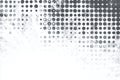 Abstract grunge halftone pattern with grey dots fading into a white textured background Royalty Free Stock Photo