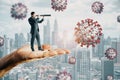 Abstract hand holding man with telescope looking into the distant future on daylight city background with virus. Pandemic,