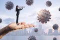 Abstract hand holding woman looking into the distant future on daylight city background with virus. Pandemic, epidemic,
