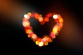 abstract heart shape bokeh colorful on dark background