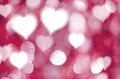 Abstract hearts and red bokeh light background