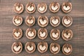Abstract hearts in walnuts on wooden background Royalty Free Stock Photo