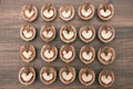 Abstract hearts in walnuts on wooden background