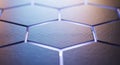 Abstract hexagonal grid pattern with subtle blue and purple shimmering light effects Royalty Free Stock Photo