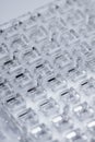 Abstract high-tech background. A sheet of transparent plastic or glass with the cut out holes. Laser cutting of Royalty Free Stock Photo