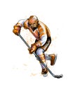 Abstract hockey player from splash of watercolors. Hand drawn sketch. Winter sport