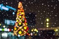 Abstract background with decorated Christmas tree, defocused bokeh lights Royalty Free Stock Photo