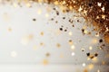 Abstract holiday background with sparkles and highlights, gold bokeh. Blurred sparkling background with place for text