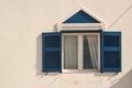 Abstract of Home Wall and Window with Shutters on the Island of Santorini Greece
