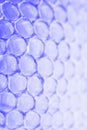 Abstract honeycomb cells pattern in violet blue tones