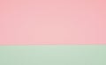 Abstract horizontally divided bi-color retro background, paper texture. Pastel pink and green color