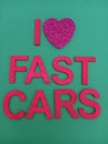 Abstract I love fast cars sign with a heart shape instead of the word love on a green background