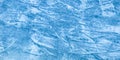 Abstract ice texture. Nature blue background. Traces of blades of skates on ice Royalty Free Stock Photo