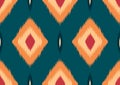 abstract ikat ethnic seamless pattern, geometric shape red and yellow on green background, design templates for wallpaper, carpet Royalty Free Stock Photo