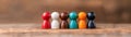 Supporting Figures Outlined People in a Row, Illustrating Unity, Teamwork, and Shared Goals Diverse Colors Represent Inclusion, Royalty Free Stock Photo